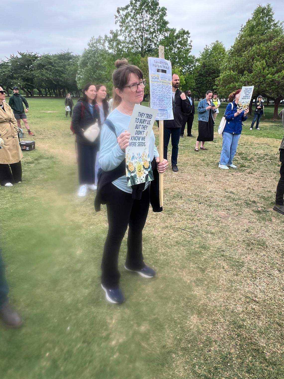 Supporters of Virginia Giuffre and other victims of Jeffrey Epstein attend the memorial service for Giuffre in Washington on Saturday, April 25, 2026, the one-year anniversary of her death. She died by suicide at age 41.
