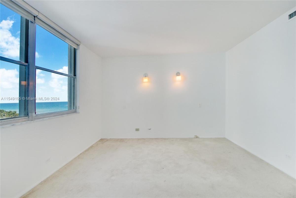 Child of the ocean? The Mid-Beach apartment has a single bedroom with side views of the beach.