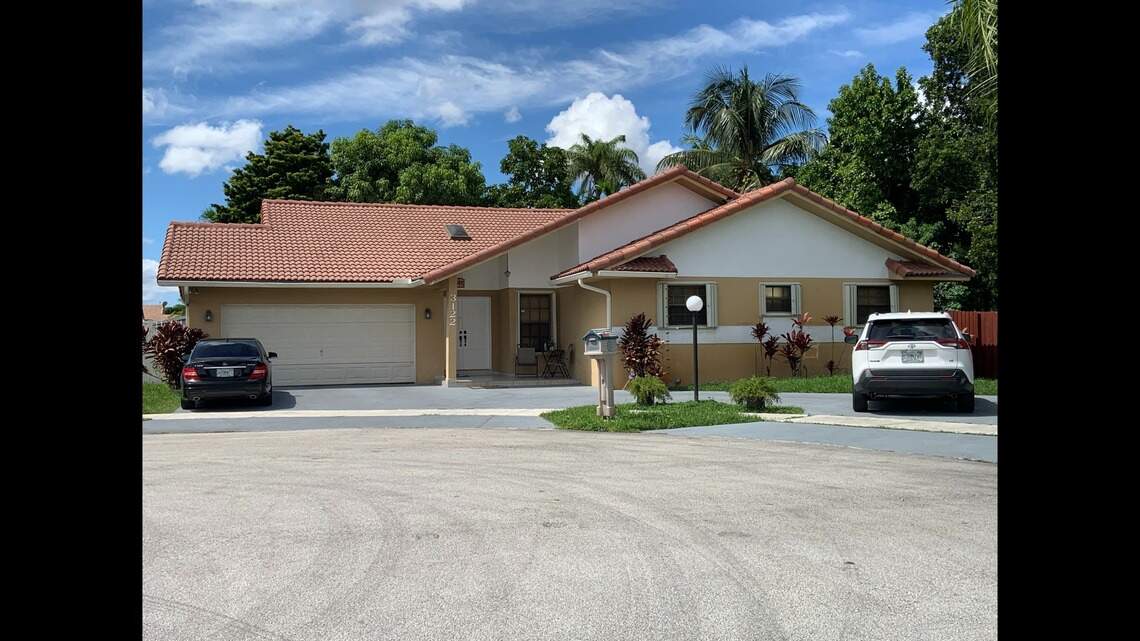 Two people made $4,250 per day from 17 women in a Miami-Dade cul de sac house, cops say