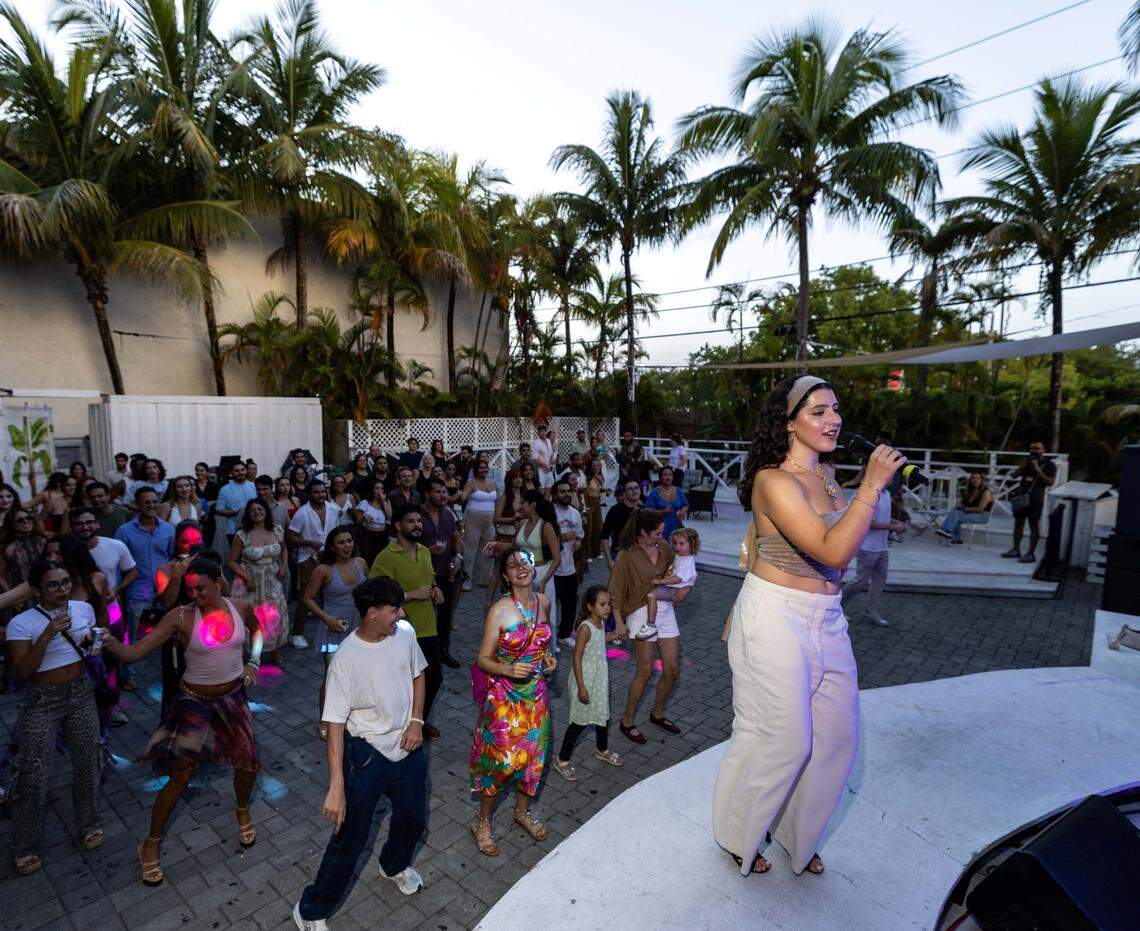 Elisa Baena teaches the basics of salsa to guests during a Salsa Z. Baena says she noticed an immediate interest in salsa once Puerto Rican superstar Bad Bunny released songs in the genre. 