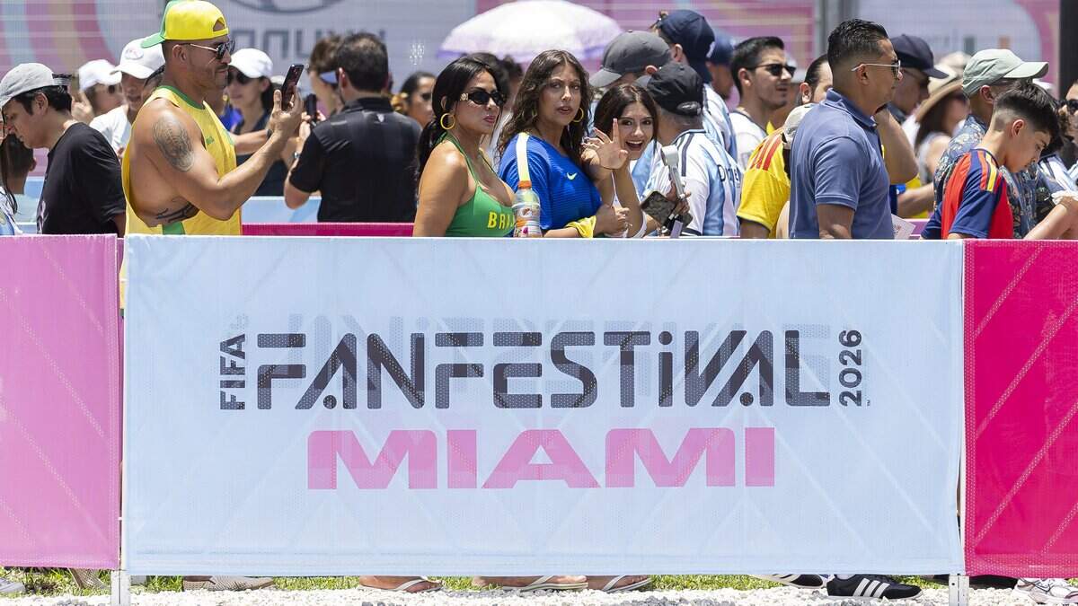 People arrive to the FIFA Fan Festival Miami at Bayfront Park on Saturday, June 13, 2026, in downtown Miami. Miami-Dade County is funding the free monthlong event as part of a $46 million subsidy package for World Cup that is now expected to be reduced with the influx of federal grant dollars for the global soccer tournament.