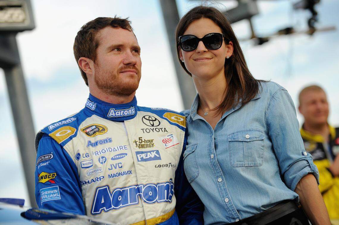 NASCAR driver Brian Vickers and his wife, Sarah, take part in pre-race ceremonies in Sparta, Ky., on June 28, 2014. She was known as Sarah Kellen when she was an aide to Jeffrey Epstein. According to police, she scheduled visits of underage girls to Epstein’s Palm Beach estate for massages that turned sexual. She was not charged with a crime.