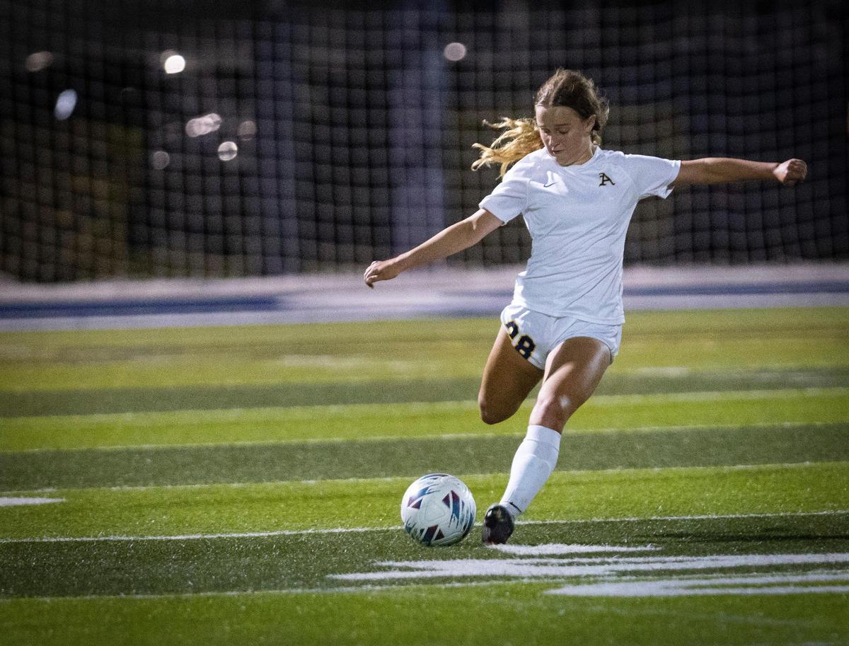 St. Thomas Aquinas’ Madison Poleo (28) kicks the ball during the second half of the regional soccer final against Our Lady of Lourdes on Wednesday, Feb. 21, 2024, at Columbus High School in Miami.