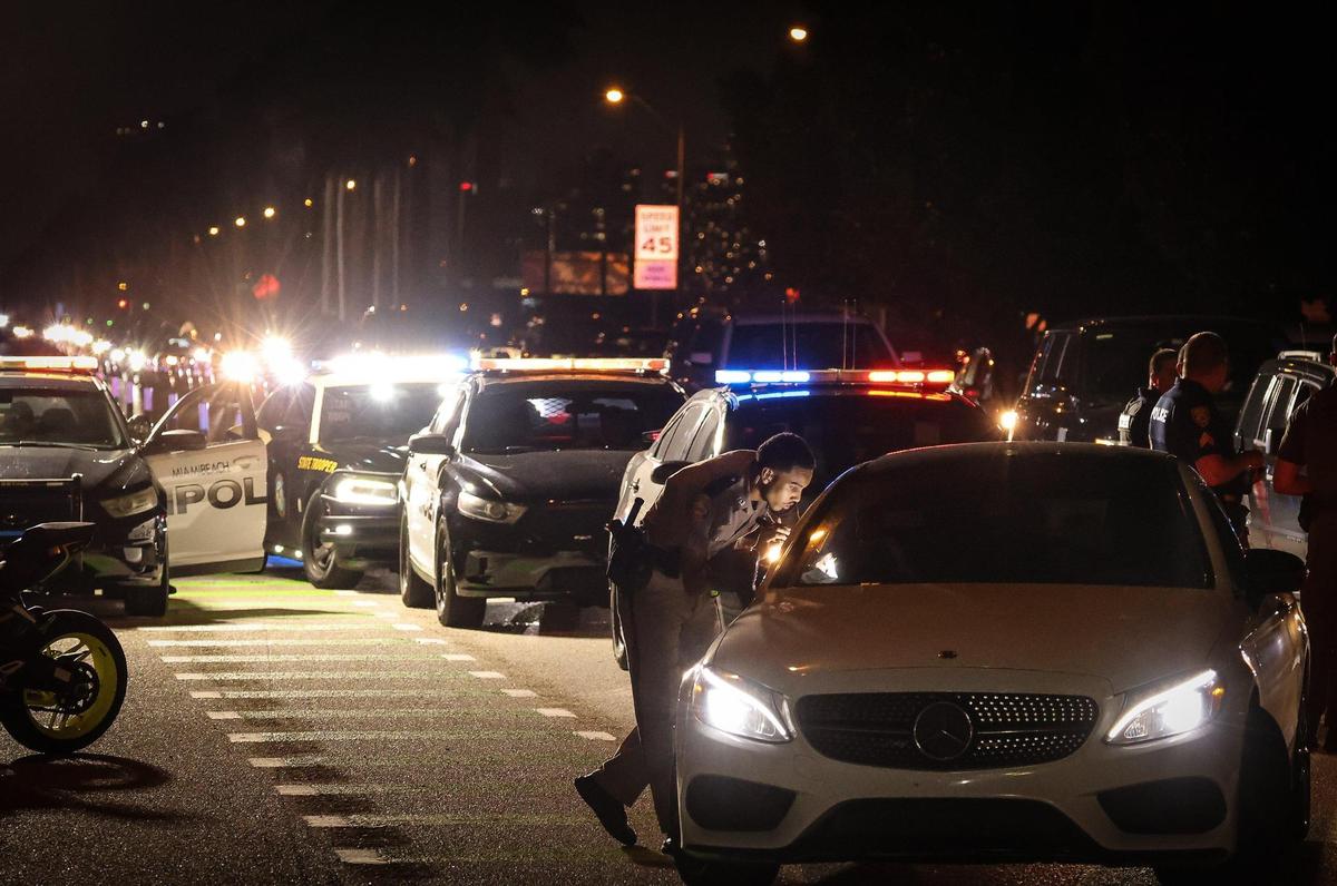 In the evening, traffic slowed to a standstill into Miami Beach from the MacArthur Causeway as city officers and Florida Highway Patrol deputies began a license plate reader detail on Sunday, March 10, 2024 eastbound between Star Island and Terminal Island in Miami Beach, Florida. .