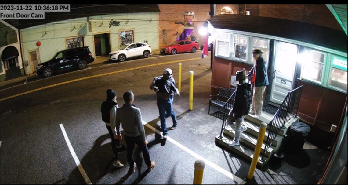 This photo shows Dembele being pulled backward before he was thrown to the ground, according to his lawsuit.