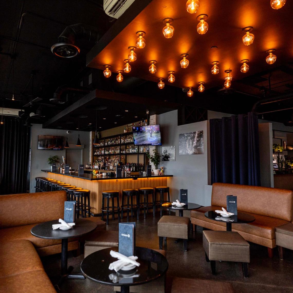 The bar and lounge at Kitchen 57, which now has a mixologist and specialty cocktails.