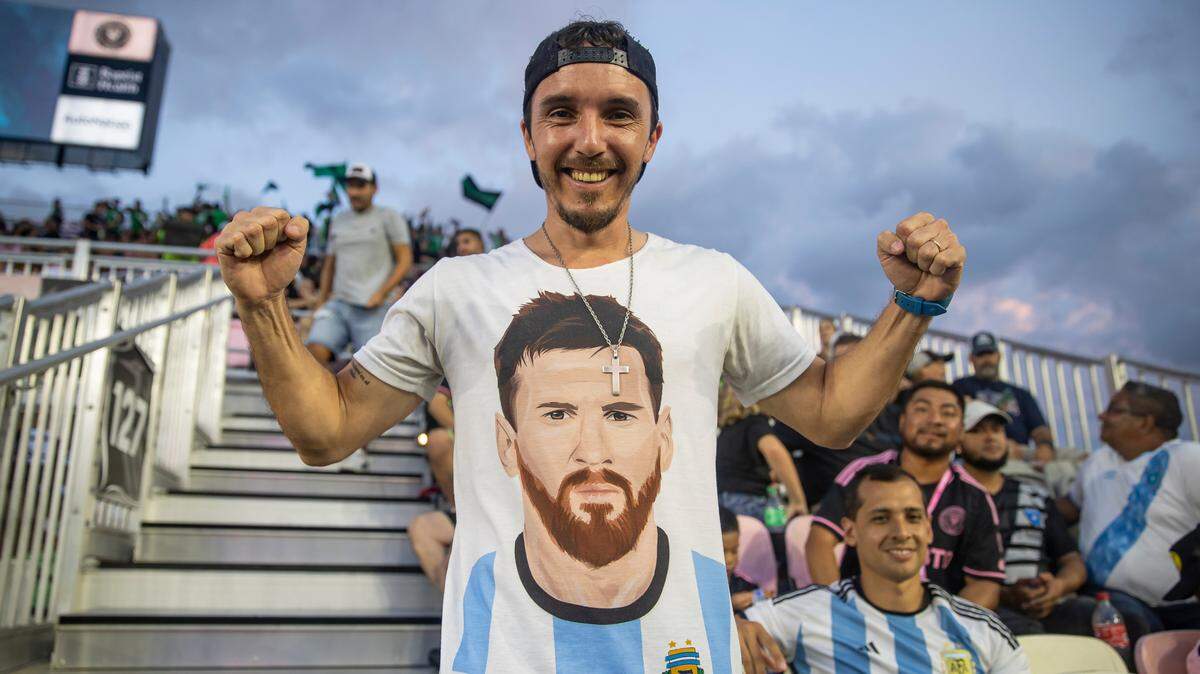 Inter Miami fan Harold Fores Vandecaveye, 36, shows his Messi shirt as his team plays against Austin FC in the first half of their MLS match at DRV PNK Stadium on Saturday, July 1, 2023, in Fort Lauderdale, Fla.