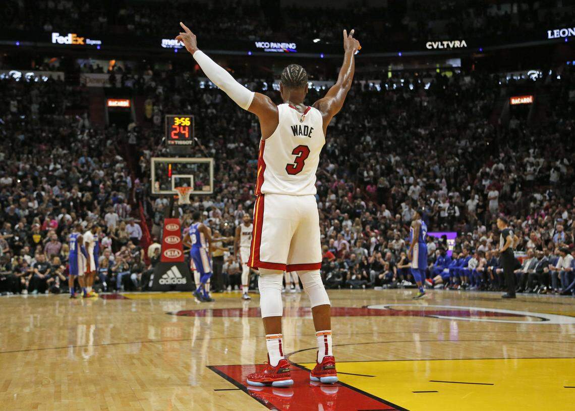 Miami Heat guard Dwyane Wade (3) signals in the fourth quarter as the Miami Heat host the Philadelphia 76ers at the AmericanAirlines Arena in Miami on Tuesday, April 9, 2019.