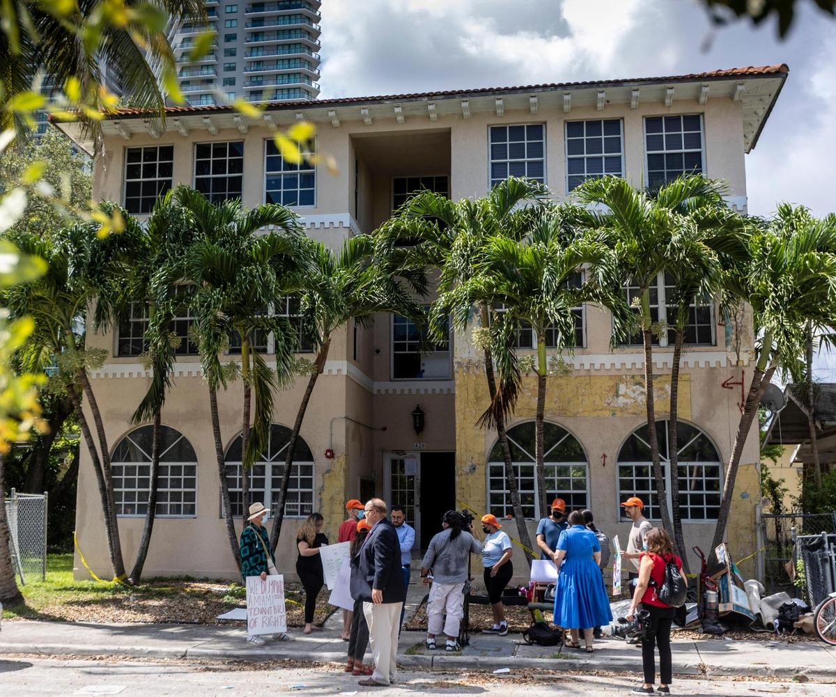 Protesters and reporters outside 426 NE 34th st., in Miami. Tenants were urged to evacuate immediately last Friday, citing building safety issues, even though engineers have deemed the building safe.