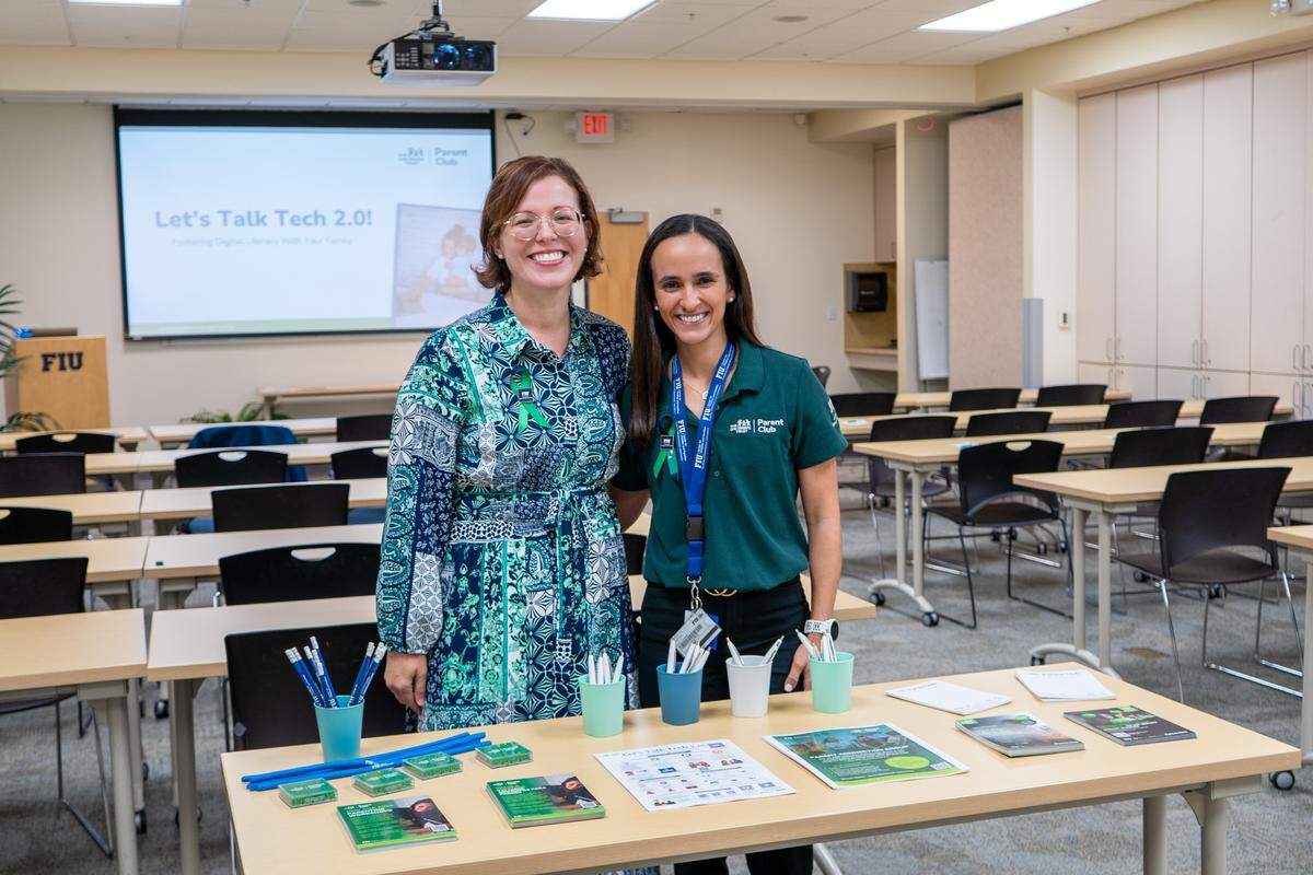 Katie Hart, director of the Center for Children and Families at FIU and Carina Alvarez, a postdoctoral associate at the center, pose at the Let’s Talk Tech 2.0 workshop on May 7.