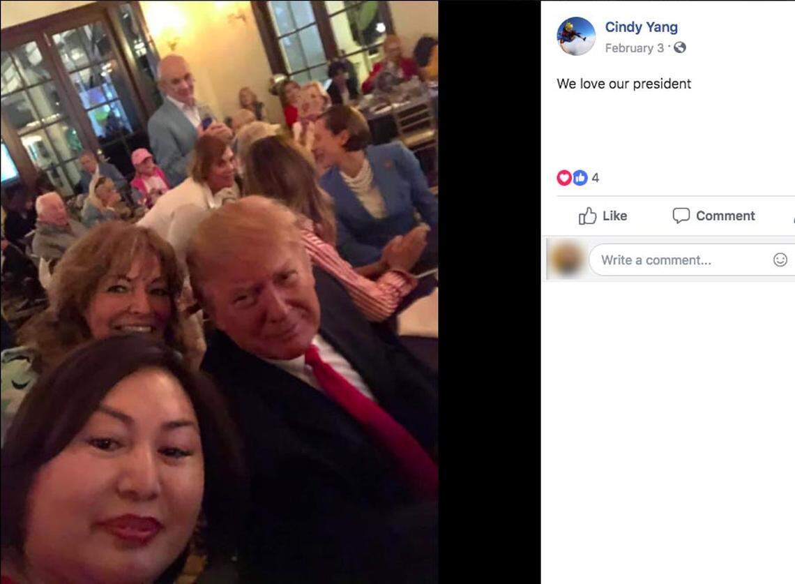 Li Yang, who goes by ‘Cindy,’ takes a selfie with President Donald Trump.