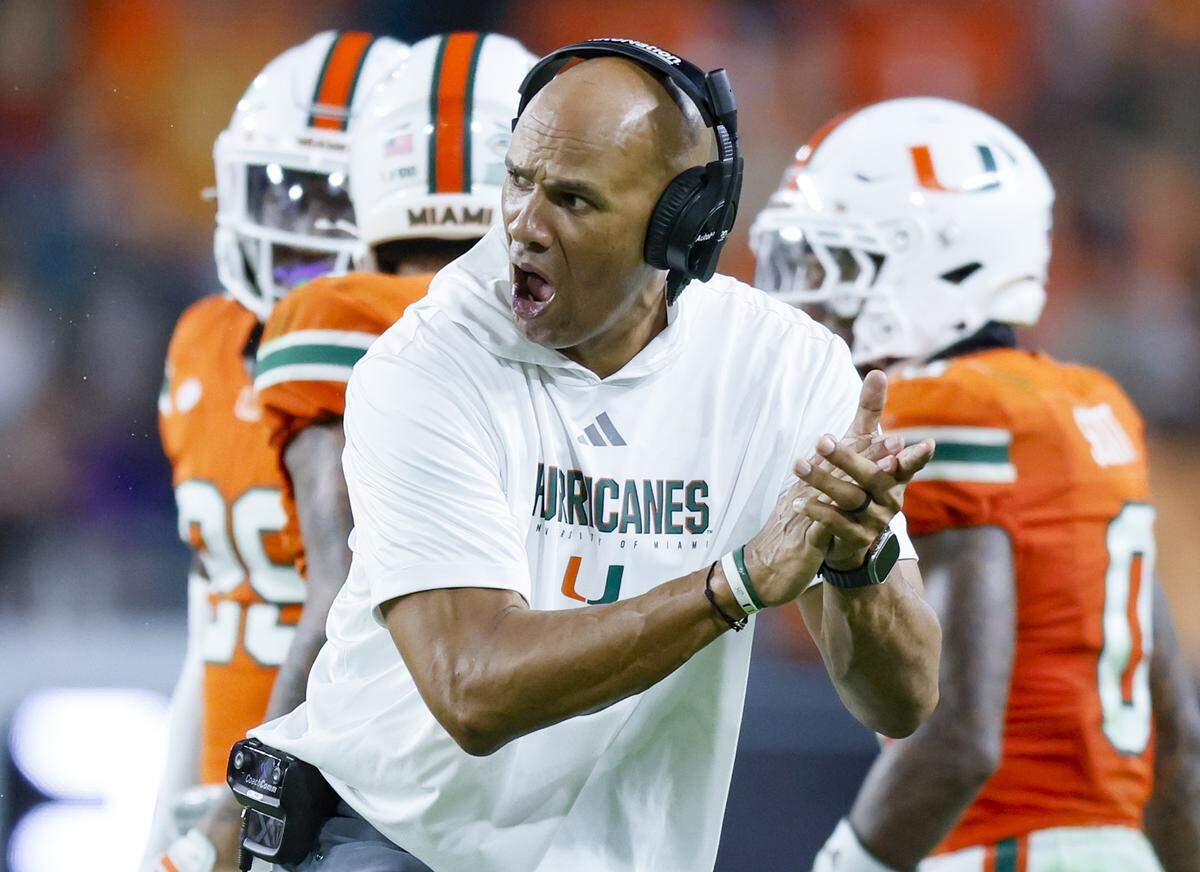 Miami Hurricanes defensive line and defensive pass rush coordinator Jason Taylor in the second half against the Louisville Cardinals of their NCAA football game at Hard Rock Stadium in Miami Gardens, Florida, on Friday, October 17, 2025.