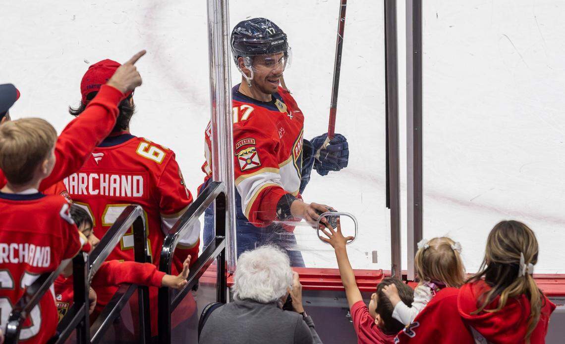 Florida Panthers center Evan Rodrigues (17) interacts with his family before playing against the Carolina Hurricanes in Game 3 during the Eastern Conference final of the NHL Stanley Cup playoffs at Amerant Bank Arena on Saturday, May 24, 2025, in Sunrise, Fla.