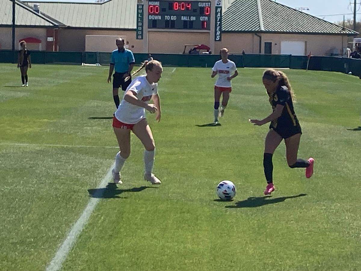 American Heritage’s Mattie Hall and Horizon’s Lily Dobson match up during Tuesday’s Class 5A state semifinal at Spec Martin Stadium in DeLand, Fla.
