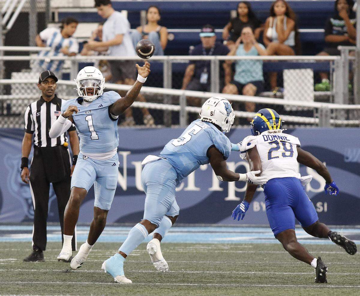 FIU Panthers quarterback Keyone Jenkins (1) throws a pass during football game against Delaware Fightin' Blue Hens Saturday, September 20, 2025 at FIU Pitbull Stadium in Miami.  Andrew Uloza / for Miami Herald