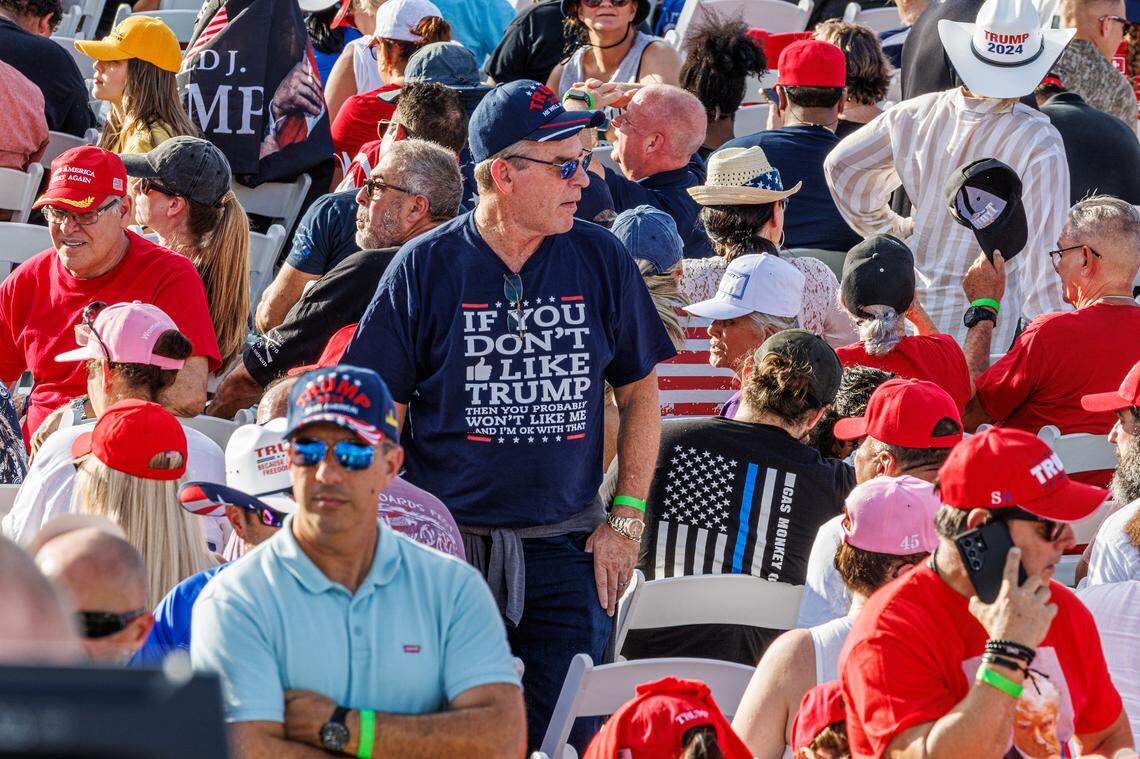 Former President Donald Trump supporters wait for his appearance during a rally at the Ted Hendricks Stadium at Henry Milander Park in Hialeah.