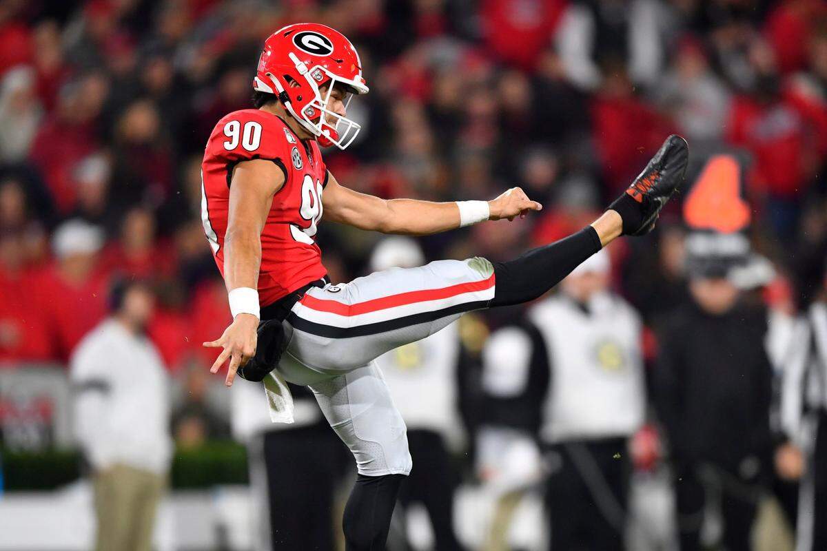 FILE - In this Nov. 9, 2019, file photo, Georgia’s Jake Camarda punts during an NCAA college football game against Missouri n Athens, Ga. Camarda was selected to The Associated Press Preseason All-America first team defense, Monday Aug. 23, 2021. (AP Photo/John Amis, File)