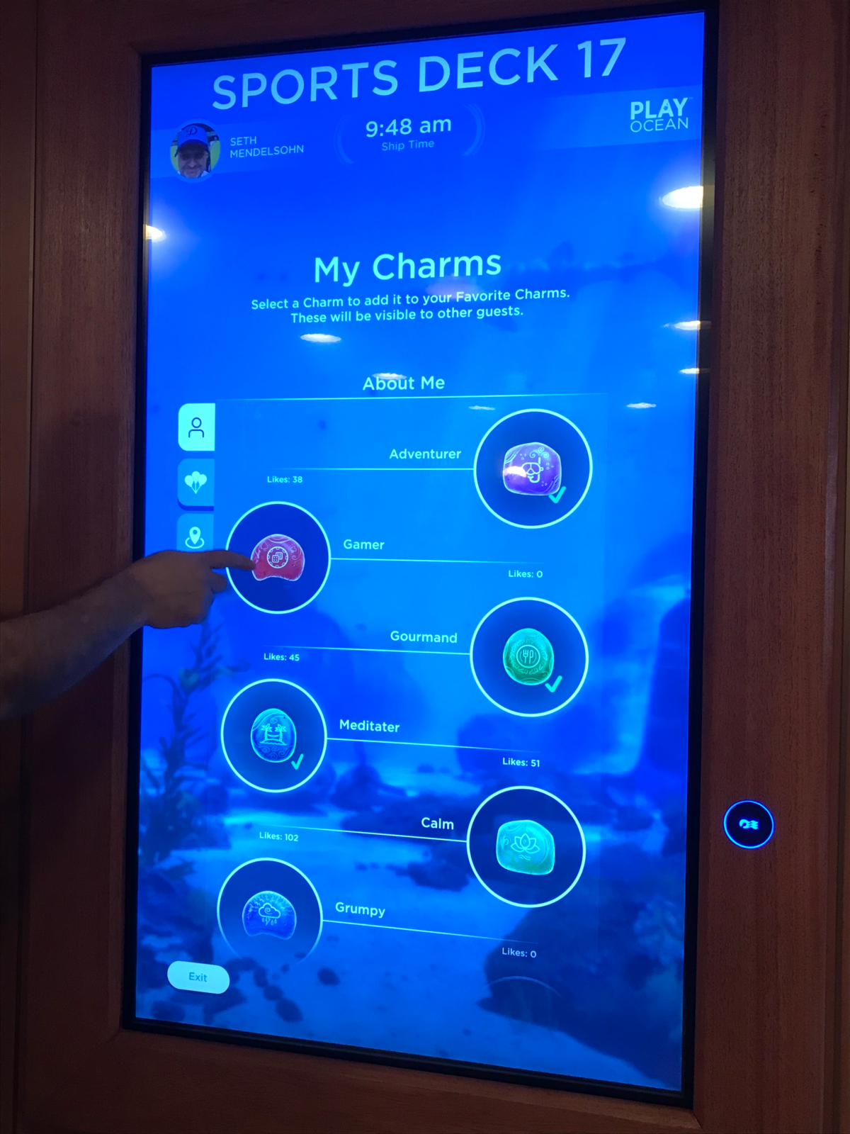 A portal on board the Caribbean Princess shows digital charms available for “tagalongs,” tamagotchi-esque digital companions that passengers can create on Carnival Corporation’s new PlayOcean app on Feb. 26, 2019.