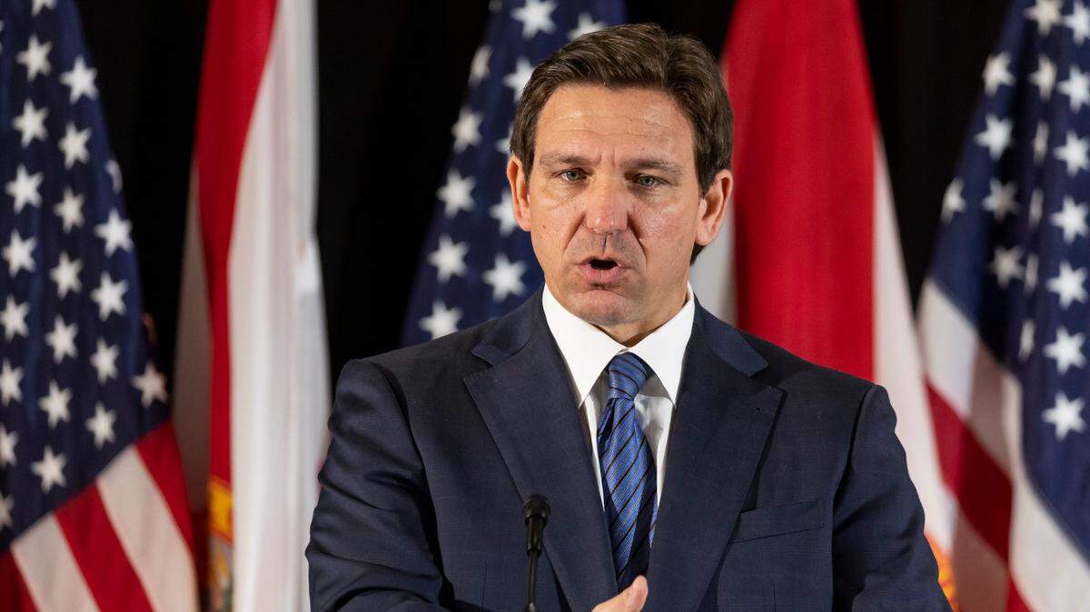 Florida Gov. Ron DeSantis during a press conference at Christopher Columbus High School March 27 in Miami.