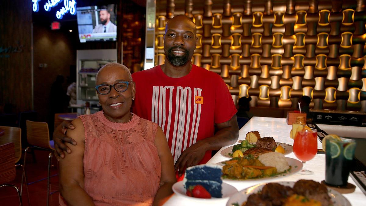 Lorna Westmoreland (l) and her son Matari Bodie, owners of the Lorna’s Caribbean and American Grill.