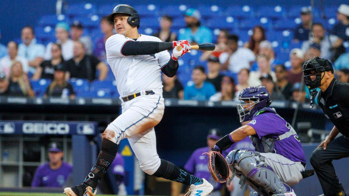 Miami Marlins right fielder Avisail Garcia (24) hits a single during the third inning of a baseball game against the Colorado Rockies at LoanDepot Park on Wednesday, June 22, 2022 in Miami, Florida.