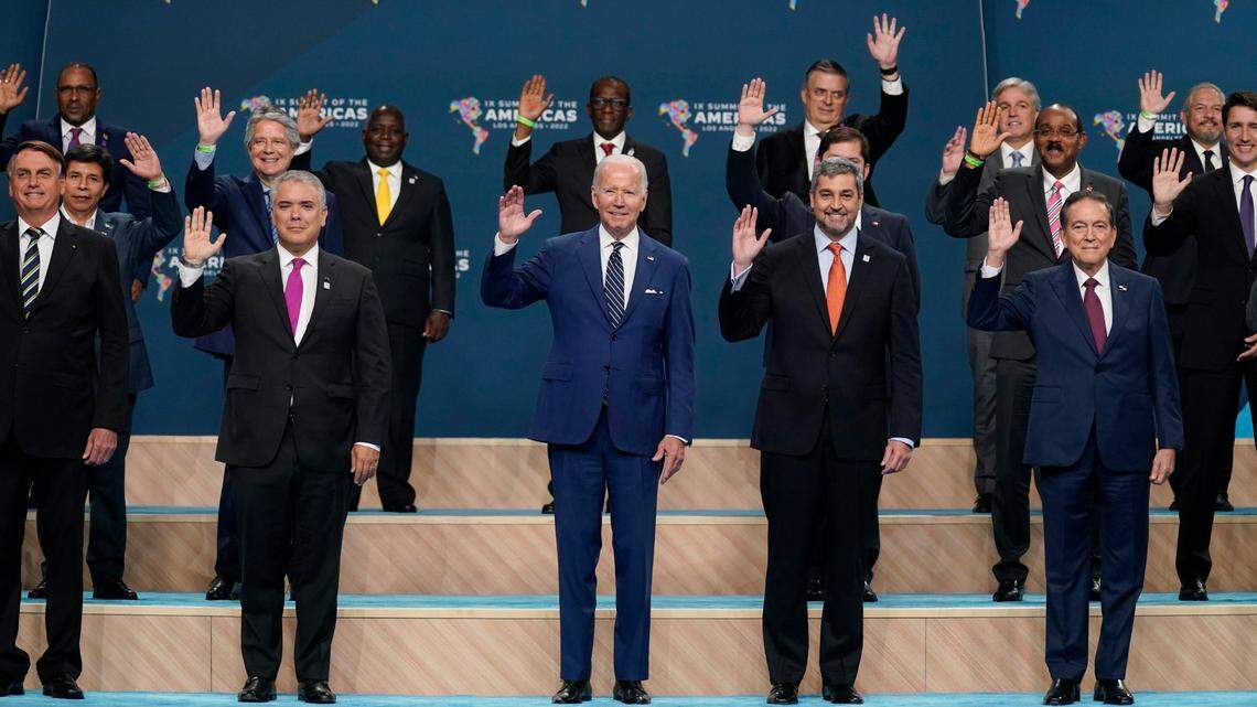 President Joe Biden, center, participates in a family photo with heads of delegations including, from left in the front row, Brazilian President Jair Bolsonaro, Colombian President Ivan Duque, Paraguay President Mario Abdo Benitez, and Panama President Laurentino Cortizo Cohen, at the Summit of the Americas, on June 10, 2022, in Los Angeles.