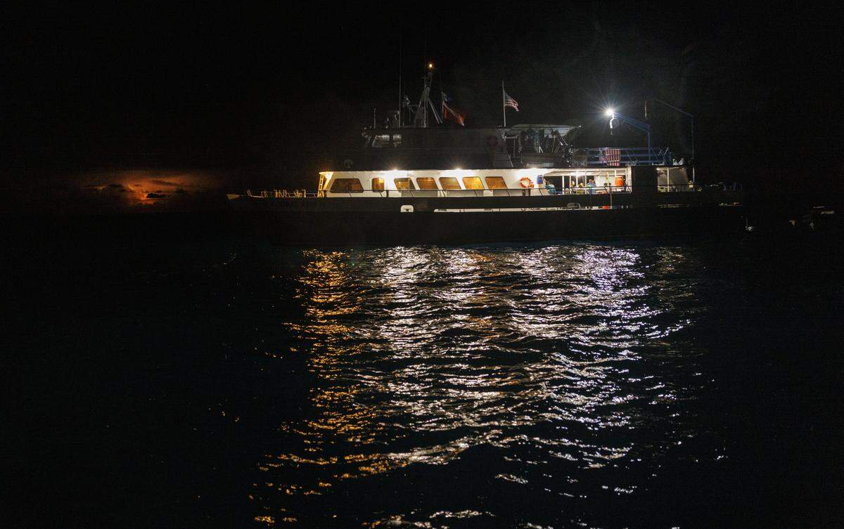 The Shedd Aquarium research vessel, called the Coral Reef II, sits in the water while scientists are in the water during the yearly coral spawning event on Tuesday, Aug. 12, 2025, at Spawning Alley, a nursery run by the Coral Restoration Foundation off of Key Largo, Fla.