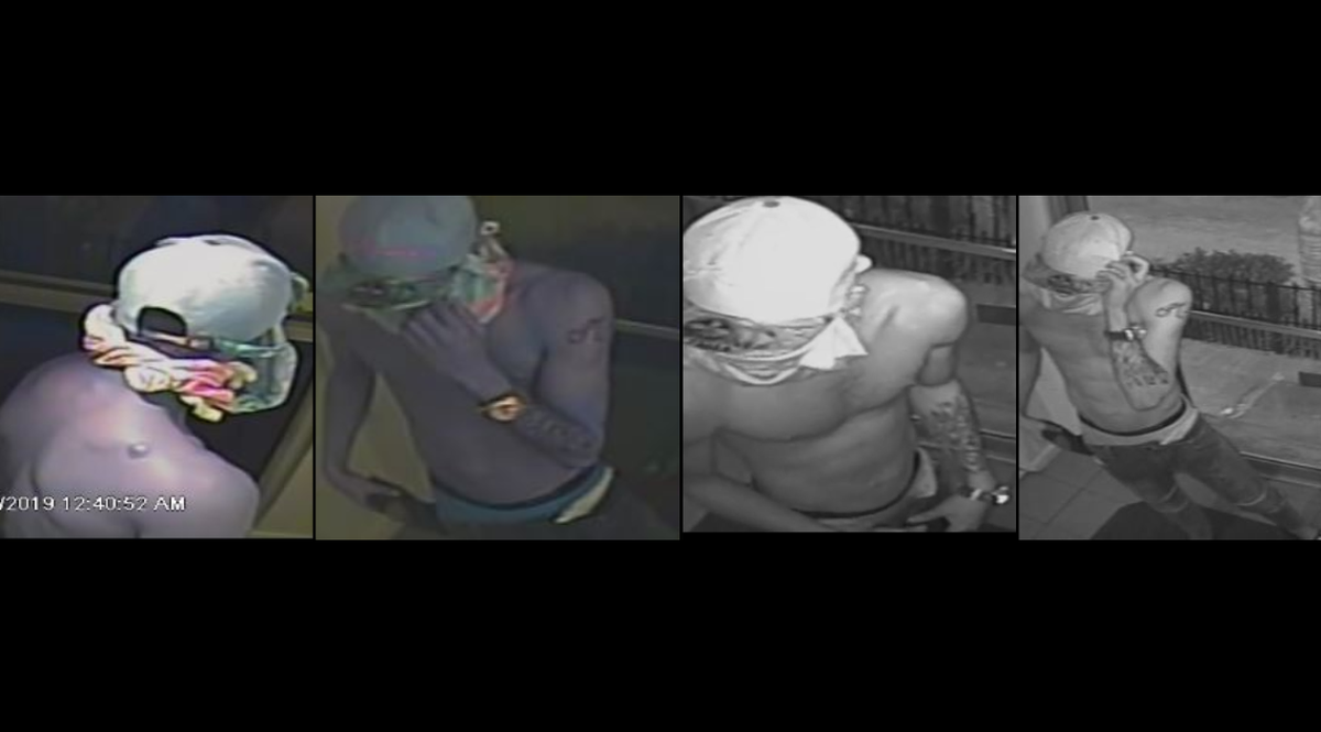 The suspect had tattoos on both arms. and was wearing a gold watch, a floral print hat, a white tank top and jean shorts. He also had tattoos and scar on his upper back.