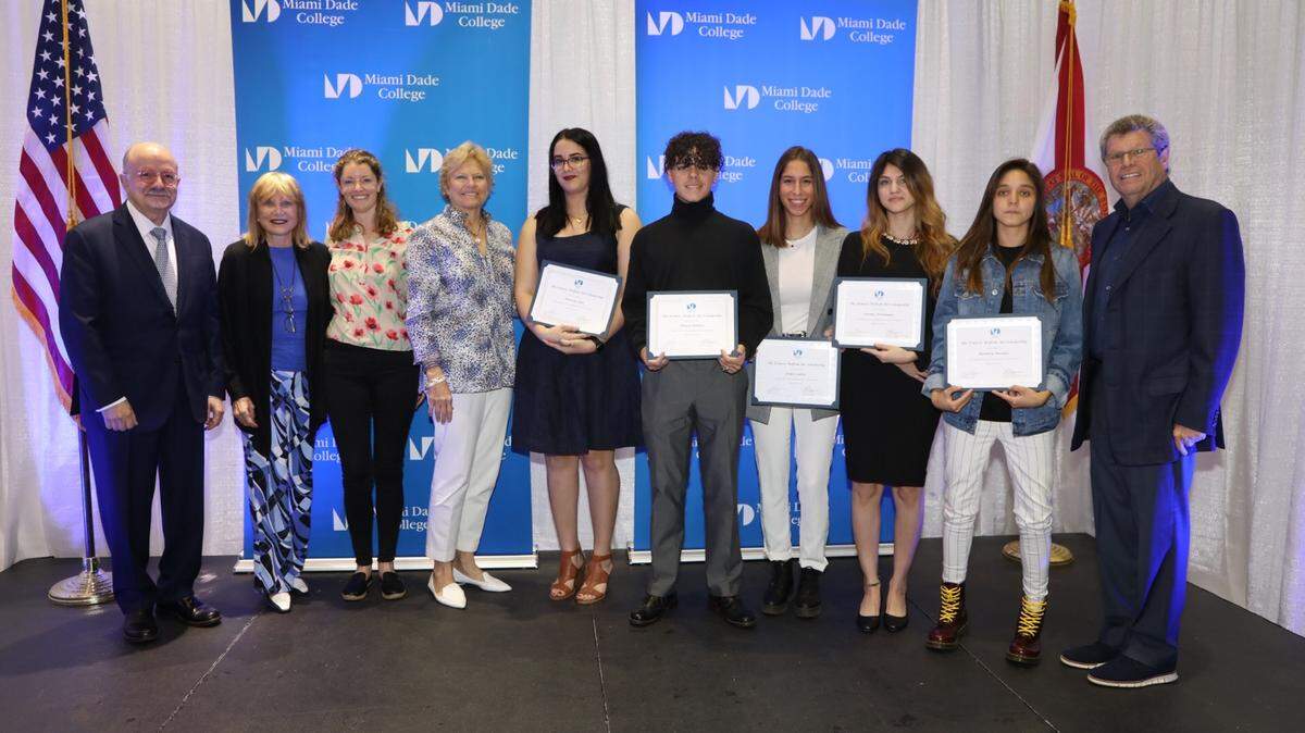 The Miami Dade College Foundation recently recognized Miami Dade College students Alexey Benitez, Erika Cantin, Lorena Fernandez, Barbara Morales, and Patricia Soler for their award-winning art submissions to the 2018 Frances Wolfson Art Scholarship Program. The winners are pictured with Eduardo Padrón, president of Miami Dade College; Frankie Wolfson, Randi Wolfson, Jeri Wolfson, and Louis Wolfson III.