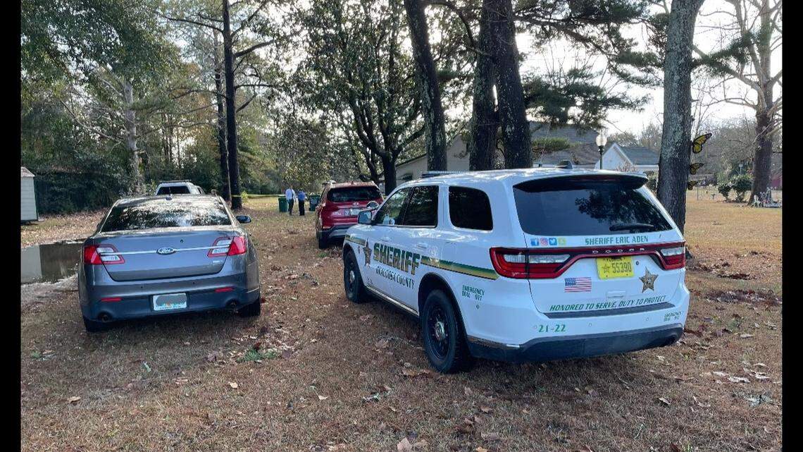 A burglary suspect out on bond is back in jail in Florida after he accidentally shot himself with a stolen gun — while breaking into a car, the Okaloosa County Sheriff’s Office says.