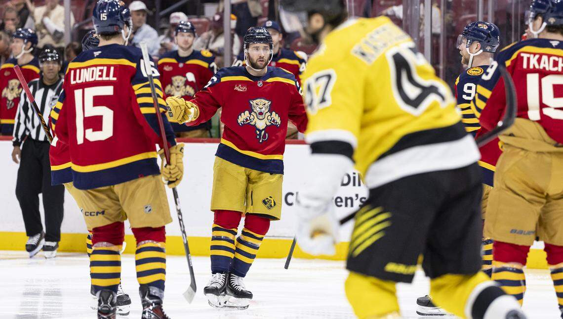 Florida Panthers defenseman Uvis Balinskis (26) celebrates after scoring against the Boston Bruins in the second period of their NHL game at the Amerant Bank Arena on Wednesday, Feb. 4, 2026, in Sunrise, Fla.