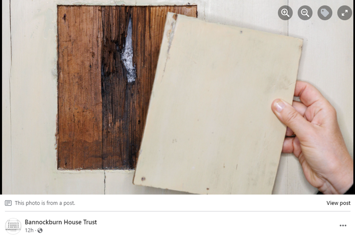 A “secret” wood panel was pulled from the wall to reveal a hole underneath, the trust said.