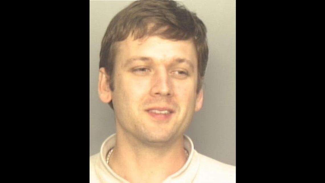 Valois Nuñez Artiles, shown in a 2003 Miami-Dade police mugshot, is accused of posing as an immigration agent to sell phony papers that helped undocumented immigrants get Florida driver’s licenses.