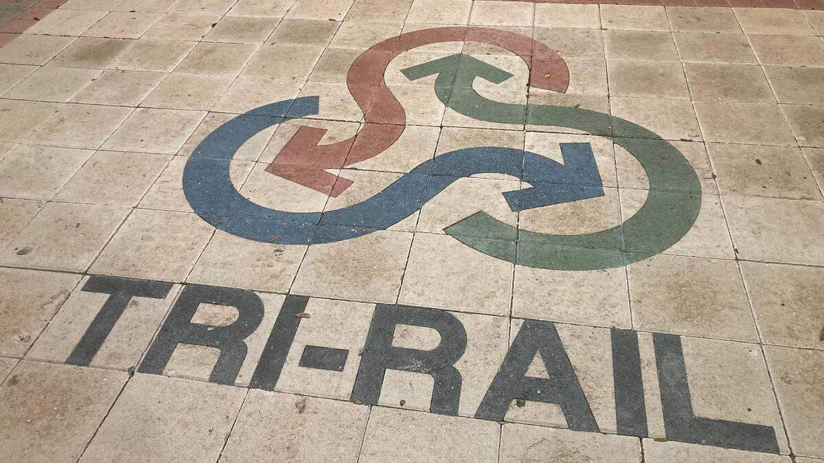 The Tri-Rail logo greets travelers at the Sheridan Street station in Hollywood.
