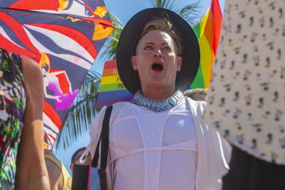 Patrick Gallineaux rallies with demonstrators carrying rainbow flags and signs reading ‘Miami Beach Forever Proud’ and ‘Won’t Be Erased’ during the Forever Proud  March on Ocean Drive in Miami Beach, Fla., Sunday, Aug. 31, 2025. The march was held after state officials ordered the removal of the city’s LGBTQ Pride crosswalk.