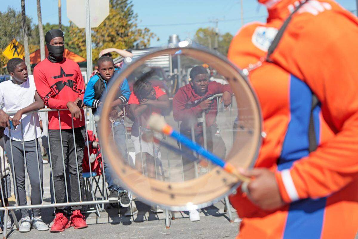 A drummer keeps the beat at the parade on Martin Luther King Jr. Day in the Liberty City neighborhood of Miami on Monday, Jan. 16, 2023.