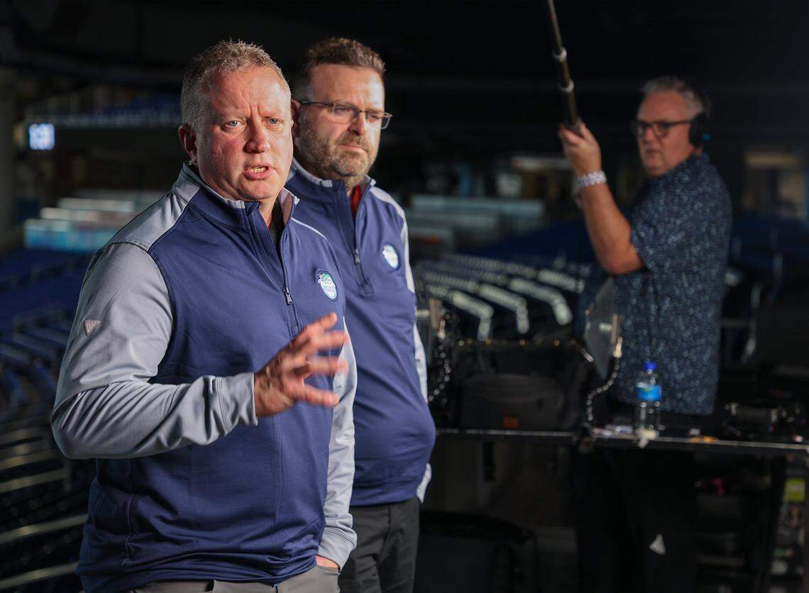 NHL VP of Hockey Operations, Derek King, left,  and  Andrew Higgins, NHL’s Senior Manager of Facilities, share how loanDepot Park will be transformed to a hockey rink during a joint press conference with Bill Zito, Florida Panthers President of Hockey Operations on Wednesday, Dec. 17, 2025, at loanDepot Park in Miami, Florida.