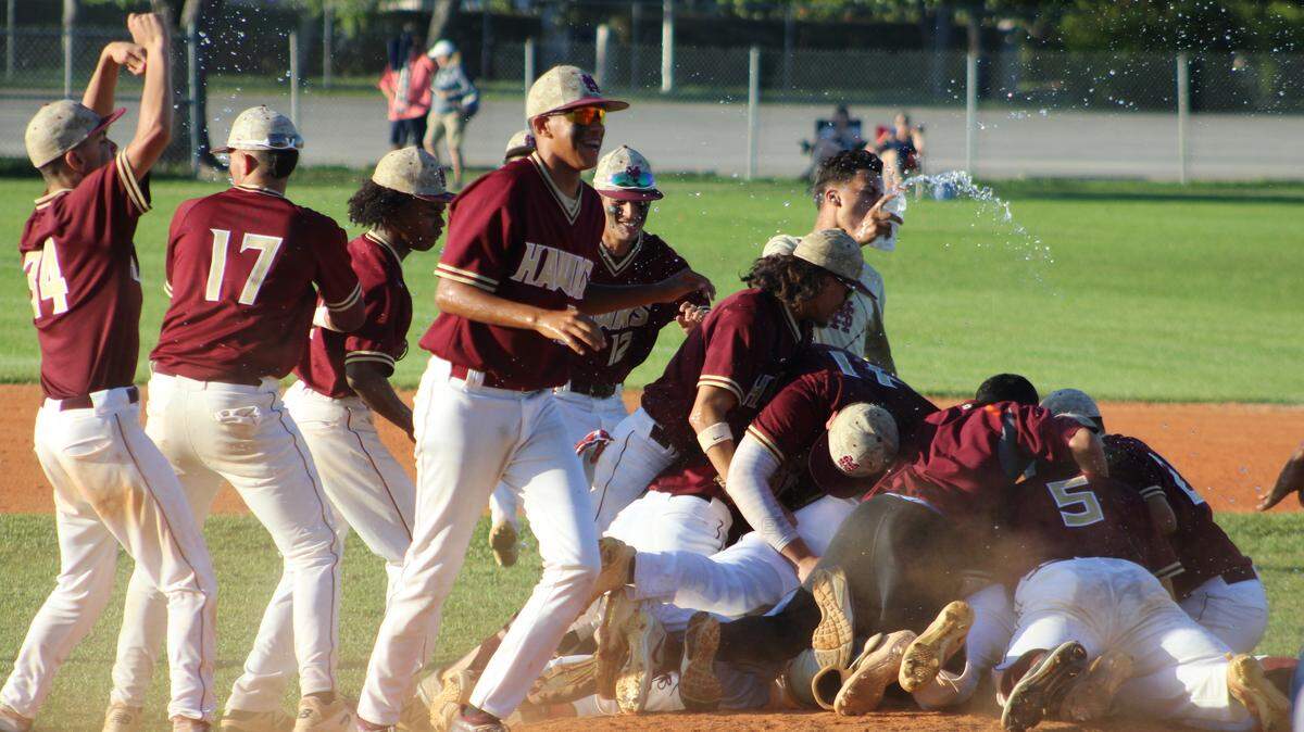 Miami Springs players hit the center of the field when the final out was recorded to celebrate the program’s first ever trip to the state final four following an 11-5 win over Eau Gallie on Wednesday afternoon at Miami Springs High School.