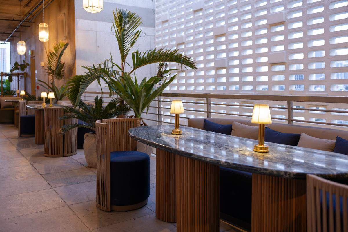 Indoor tables at La Ferneteria Italian restaurant in Miami.