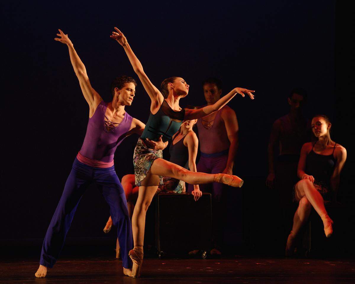 Provocatively titled, “Ballet of (Wo)Men,” the program features two Balanchine ballets and Tchaikovsky’s Pas De Deux, as well as “Imagined Notions” by South Florida choreographer Yanis Pikeiris, and a world debut of Leonardo Reale’s Tangos del Plata. Pictured: Gabriele Mesa, held from behind by Fabian Morales with Selah Jane Oliver, seated, and Stephan Fons in backdrop