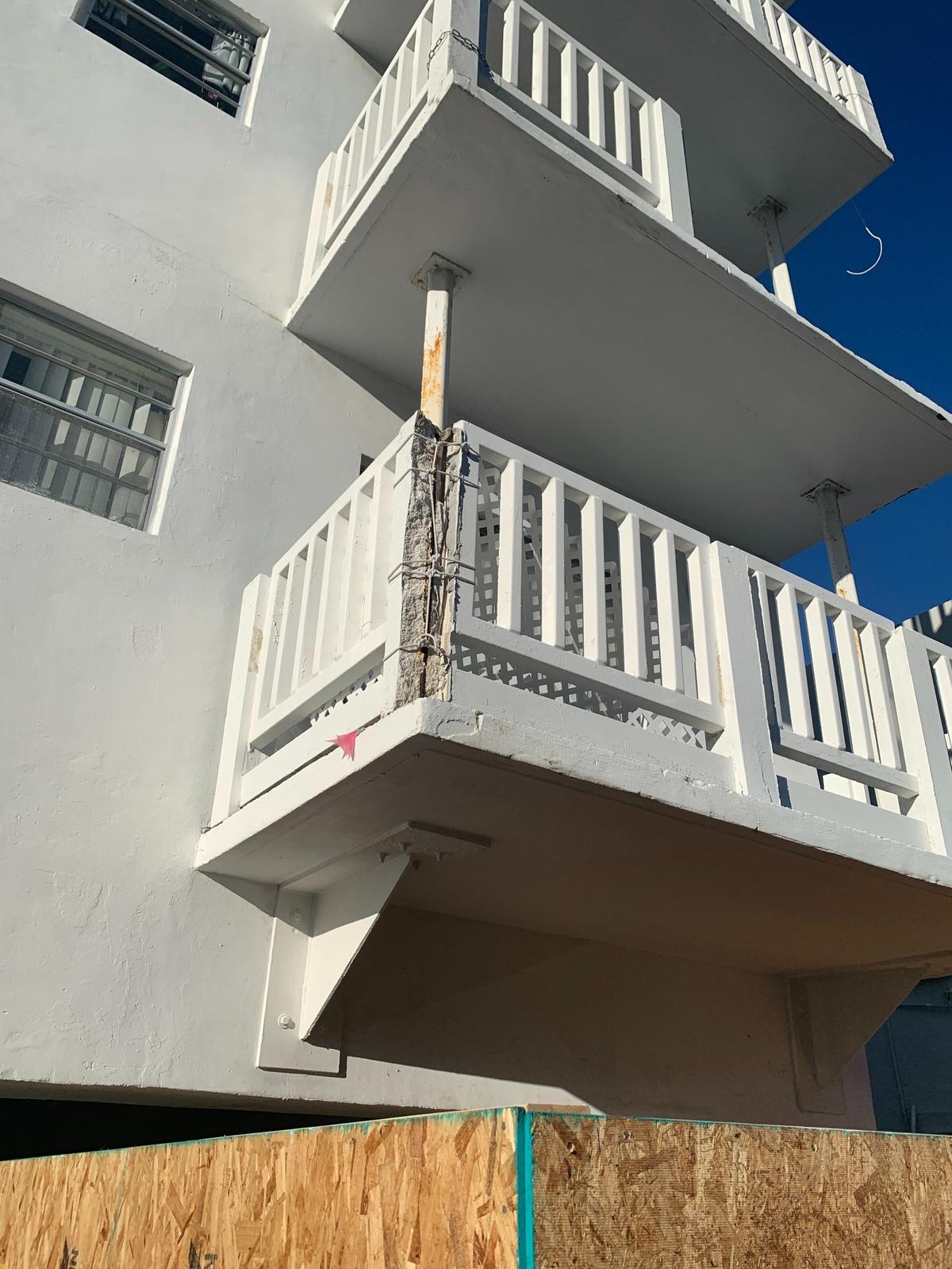 The Lois Apartments, at 2001 Bay Dr. in Miami Beach, sustained balcony damage in 2017 but repairs have yet to begin. The building owner, Surfside Mayor Charles Burkett, blames delays in the city’s permitting process and hiring challenges during COVID-19.