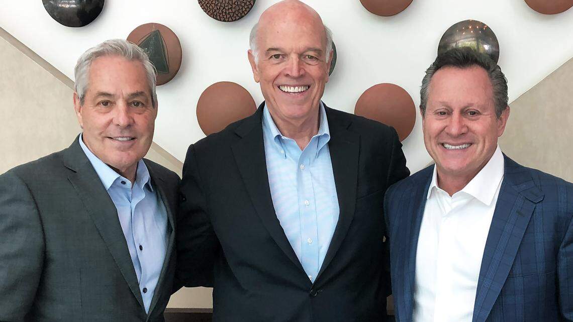 From left, Ron Peltier, executive chairman of HomeServices of America; Ron Shuffield, CEO, Berkshire Hathaway HomeServices EWM Realty; and Gino Blefari, CEO of HomeServices of American and chairman of Berkshire Hathaway HomeServices.