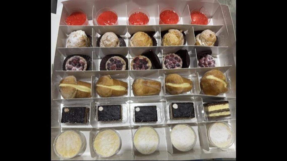 From the top row down, Sweet Cream’s Mini Strawberry Mousse; Chantilly Cream Puff; Mini Wild Berry Tart; Rum Baba with Chantilly Cream; Mini Chocolate Delight; and Mini Cup of Ricotta and Pear.