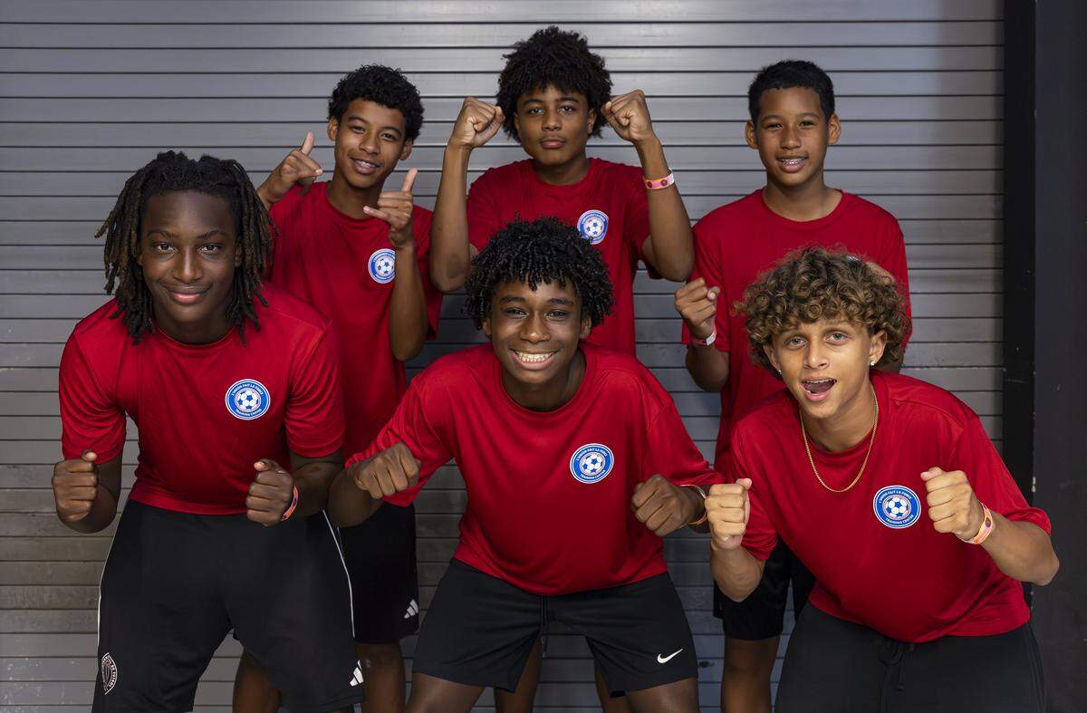 Front row left to right: Matthew Delivrance, 15, Gabriel Benjamin, 15, and Noah Cianciullu, 15, and back row left to right: Nohe Chevry, 16, Didier Gabriel, 16, and Liam Chevry, 14, react as they get ready to watch a friendly soccer match between Haiti and New Zealand at Chase Stadium on Tuesday, June 2, 2026, in Fort Lauderdale, Fla.