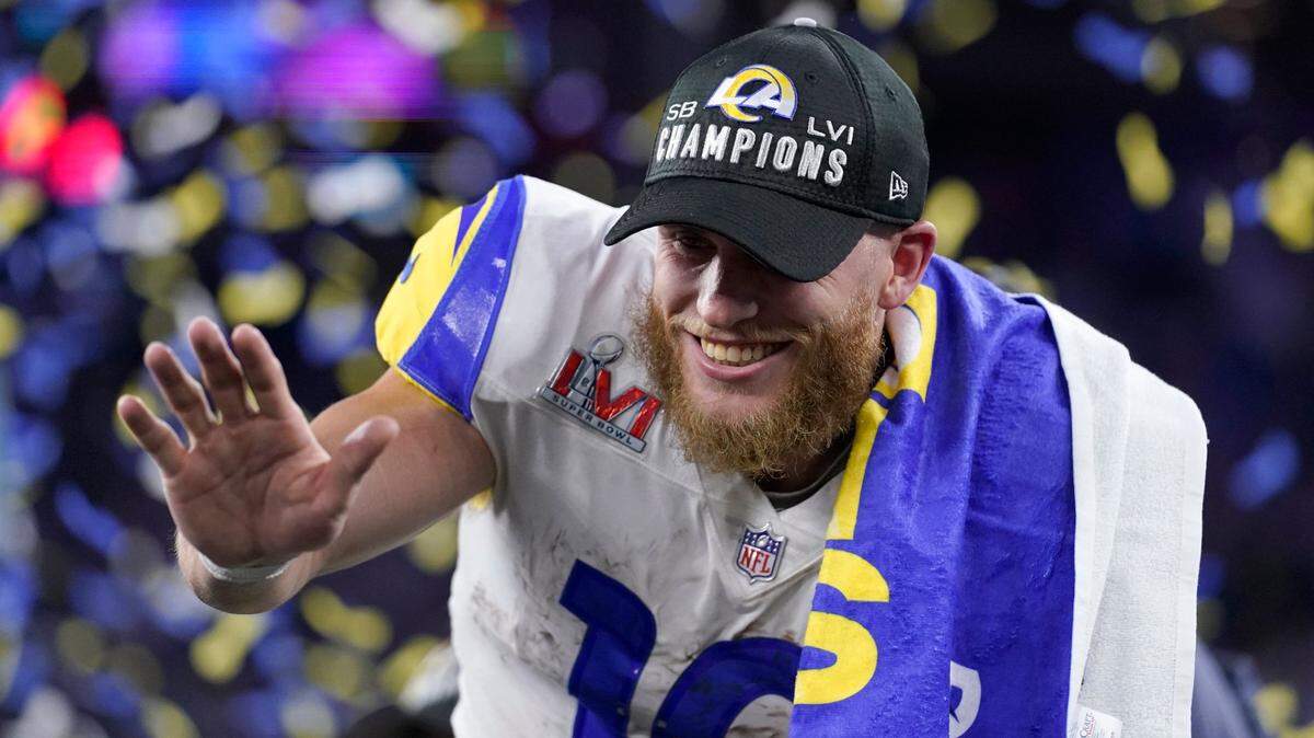 Los Angeles Rams wide receiver Cooper Kupp waves after the Rams defeated the Cincinnati Bengals in the NFL Super Bowl 56 football game Sunday, Feb. 13, 2022, in Inglewood, Calif. (AP Photo/Mark J. Terrill)