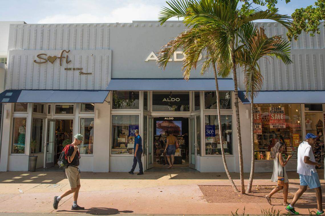 Pedestrians walk by the 635-639 Lincoln Road building on Saturday, June 16, 2018. The property's owner Aldo Group, which paid $35 million for the property in 2016, is raising the rents on the tenants. The women's clothing store Sofi on the left will soon relocate and The Shoe Shop on the right is closing permanently. The Aldo store in the middle will remain open.