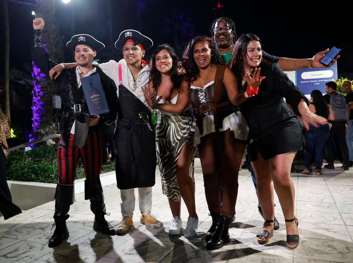 Grand Prize winner is Angel Lupiac, at left, and the team at the Kimpton Surfcomber Hotel for the best cocktail during the Art of Tiki Cocktail Showdown at the South Beach Wine & Food Festival at the Kimpton Surfcomber Hotel in Miami Beach, Florida on Saturday, February 25, 2023.