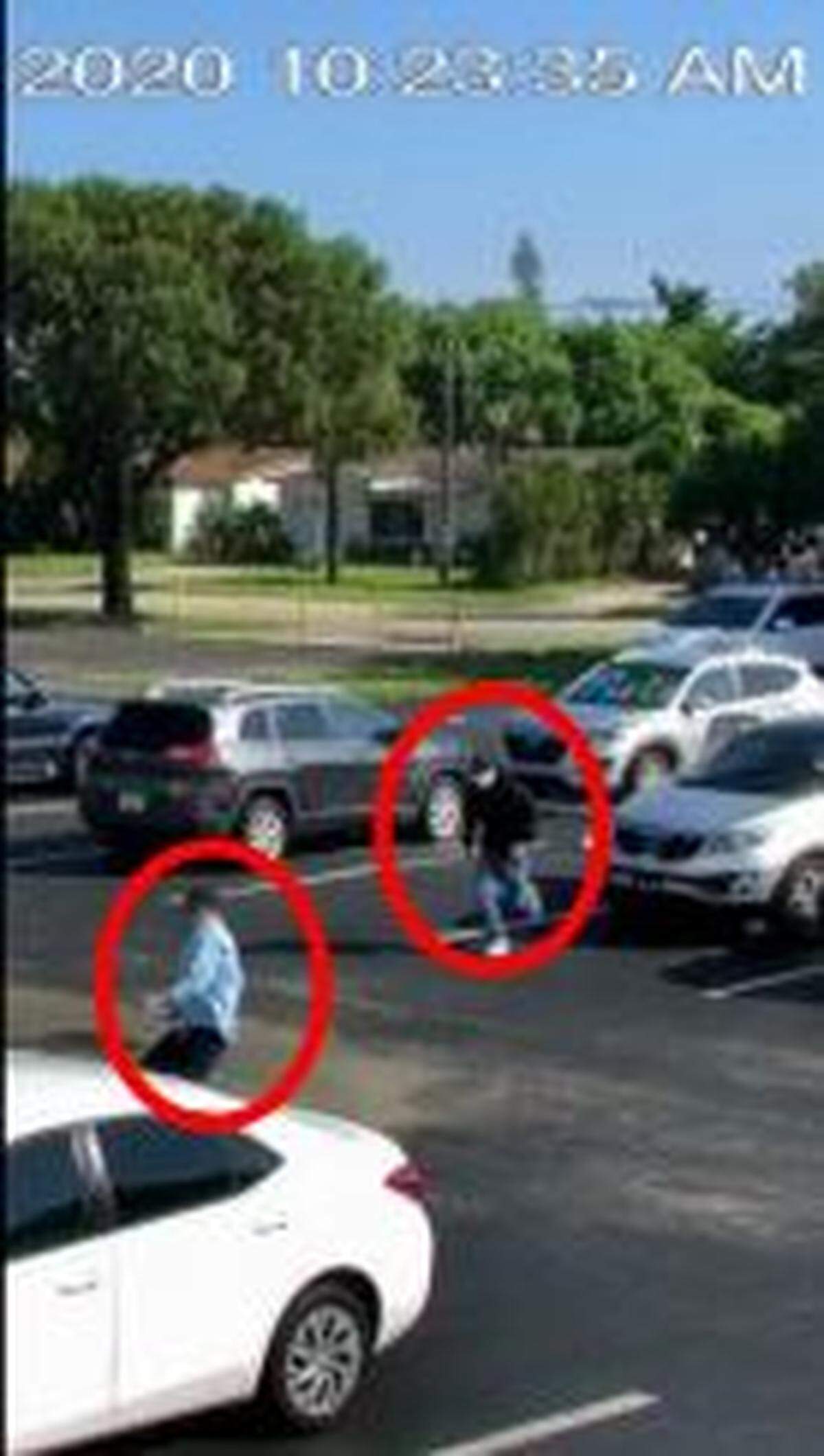 A surveillance video still spots the first two would-be armed robbers at the Castle Apartments, Oct. 13.