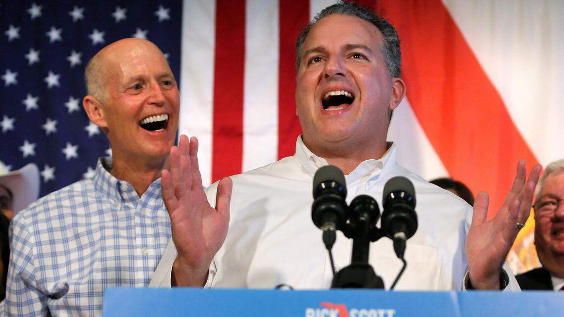 Gov. Rick Scott welcomed an emotional Florida CFO, Jimmy Patronis, to the dais as Republican nominees for the 2018 election gathered for a unity rally in Orlando, on Thursday, Sept. 6. Patronis was running for CFO after being appointed by Scott in 2017.