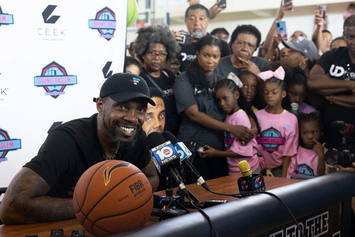 Udonis Haslem announces during his Basketball & Cheer Camp for kids at Miami Senior High on Aug. 21, 2022 that he will play his 20th and final NBA season for the Miami Heat.